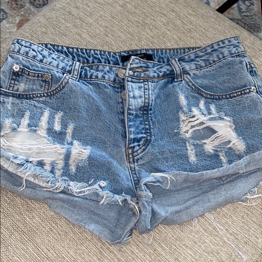 Distressed denim shorts